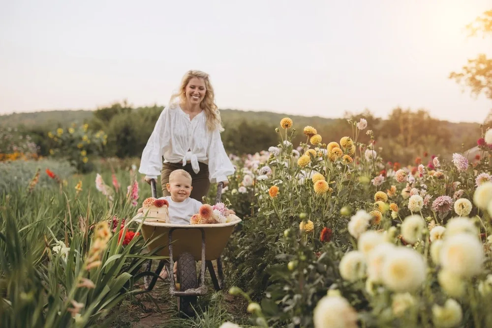 Emergency Dentistry Woodstock Woman smiling outdoors in a garden